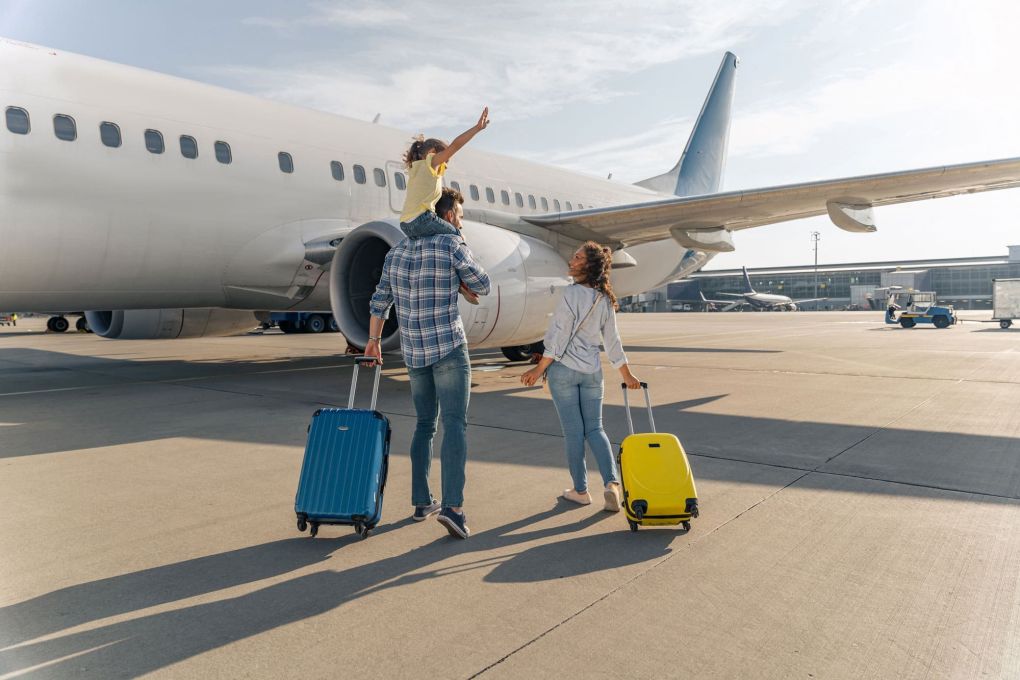 Family Boarding a plane